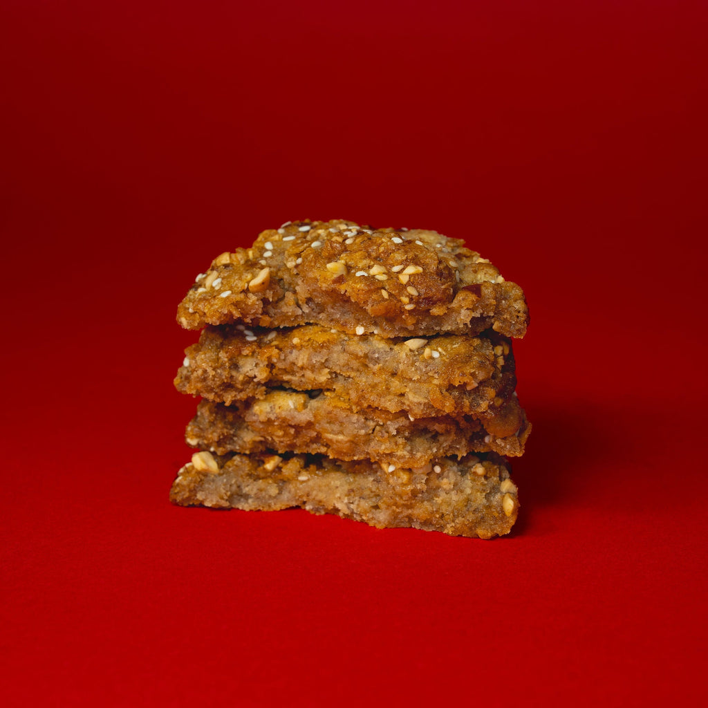 stack of gochujang cookies on red background